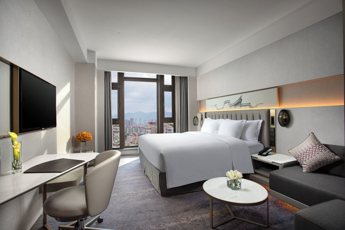 Ropa de cama de alta calidad y minibar 