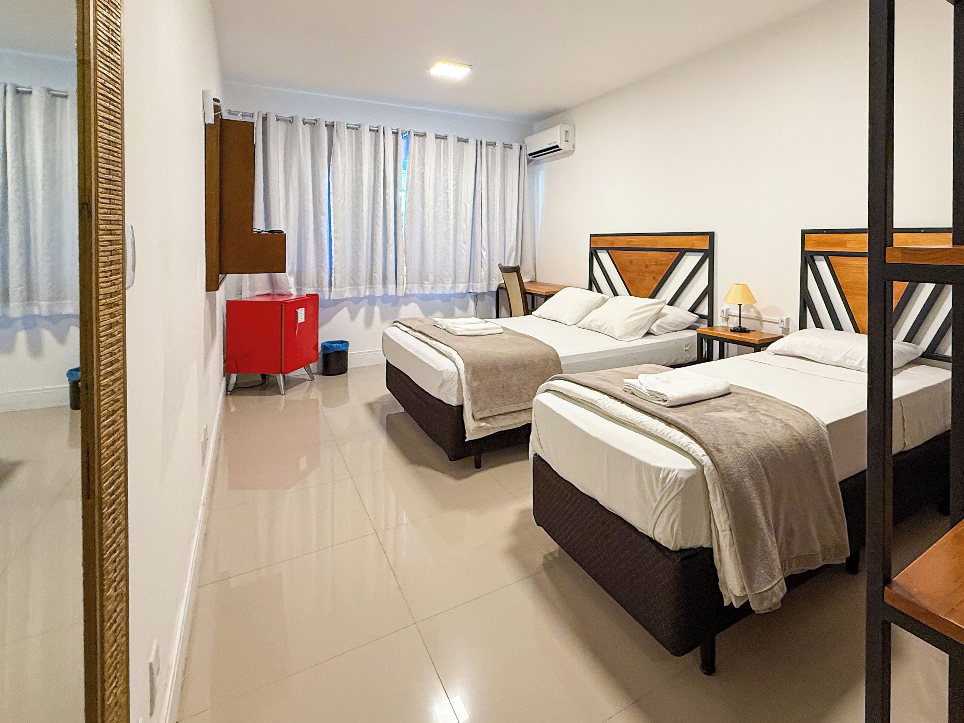 Standard Triple Room, Multiple Beds | Minibar, in-room safe, desk, free WiFi