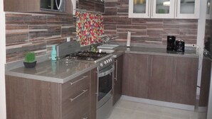 Apartment | Private kitchen | Coffee/tea maker, full-size fridge, microwave, oven - Tropical Paradise Apartment (Puerto Morelos)