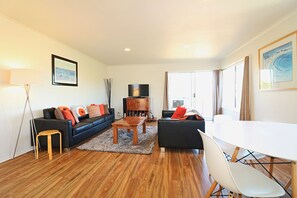 Standard 2 Bedroom Unit | Living room | Flat-screen TV, DVD player