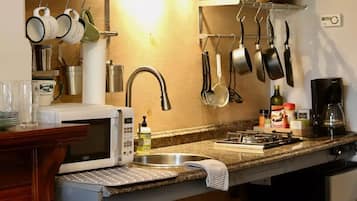 Microwave, stovetop, coffee/tea maker, electric kettle