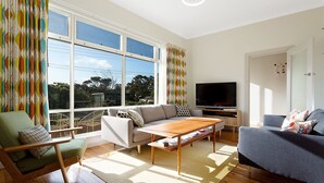 3 Bedroom House | Living room | Flat-screen TV, DVD player - The 50's Beach House (Merimbula)
