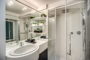 Shower, eco-friendly toiletries, hair dryer, bidet