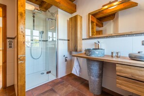 Shower, hair dryer, towels, toilet paper