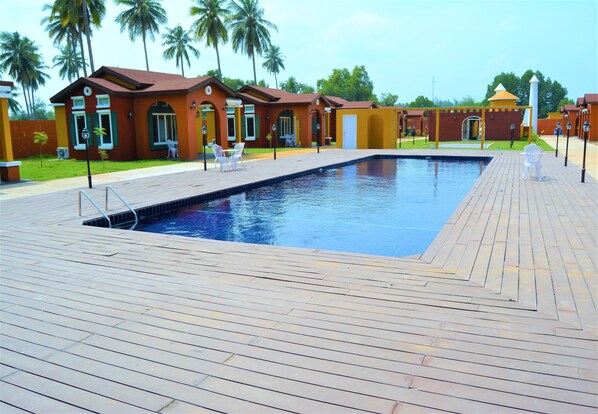 Outdoor pool, pool umbrellas, pool loungers