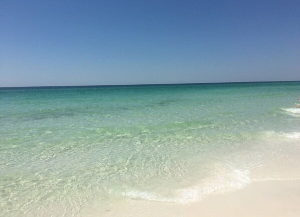 On the beach, sun-loungers, beach towels