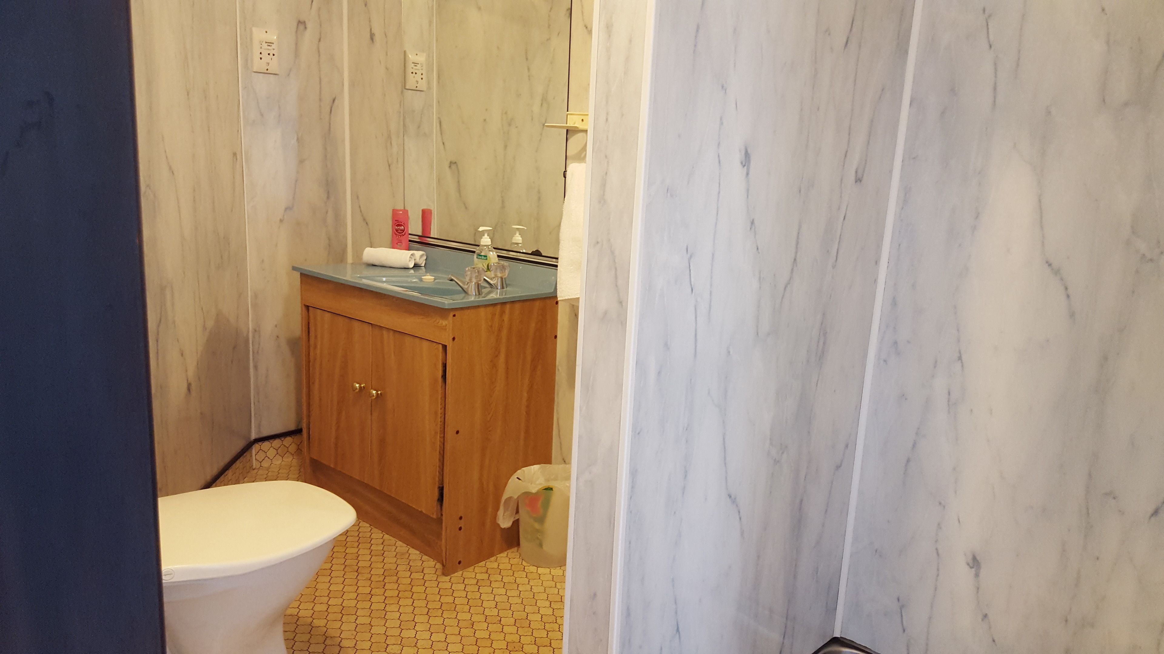 queen ensuite room with balcony | bathroom | shower, free toiletries, hair dryer, towels