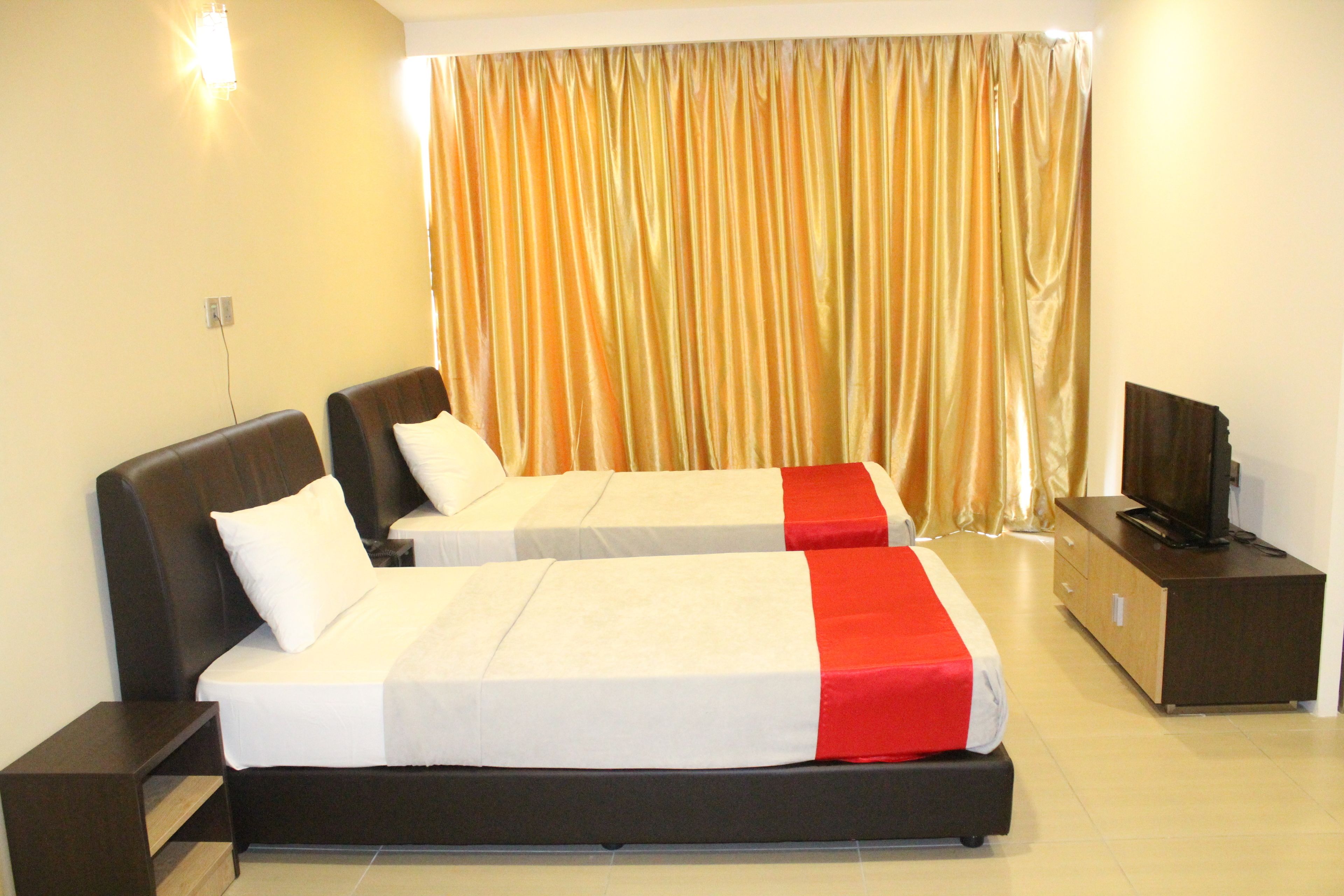 Chambre Deluxe avec lits jumeaux | Minibar, fer et planche à repasser, accès au Wi-Fi (inclus)