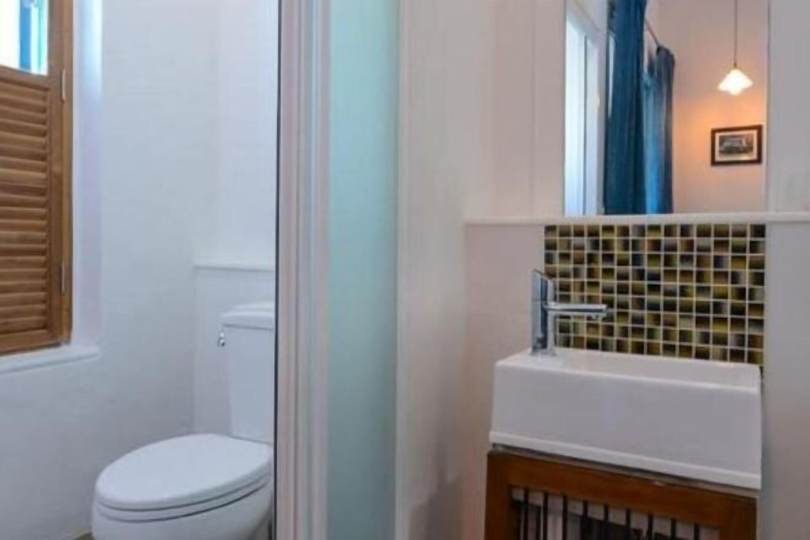 Bathroom | Shower, free toiletries, hair dryer, slippers