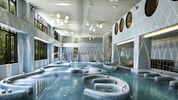 A large indoor swimming pool with multiple seating areas and a modern architectural design. - Hotel Valletta (Jiaoxi)