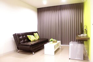 Suite | Wohnzimmer | 32-Zoll-Flachbildfernseher mit Kabelempfang, Fernseher