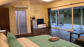 The Ozone Riverside Room | Premium bedding, free minibar, individually decorated, blackout curtains