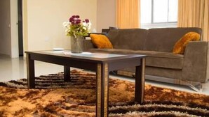 Apartemen, 2 kamar tidur | Area keluarga | TV layar datar