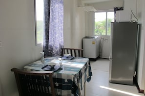 Deluxe Room, Kitchen | Room amenity