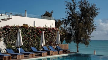 2 outdoor pools, open 7:00 AM to 8:00 PM, pool umbrellas, sun loungers