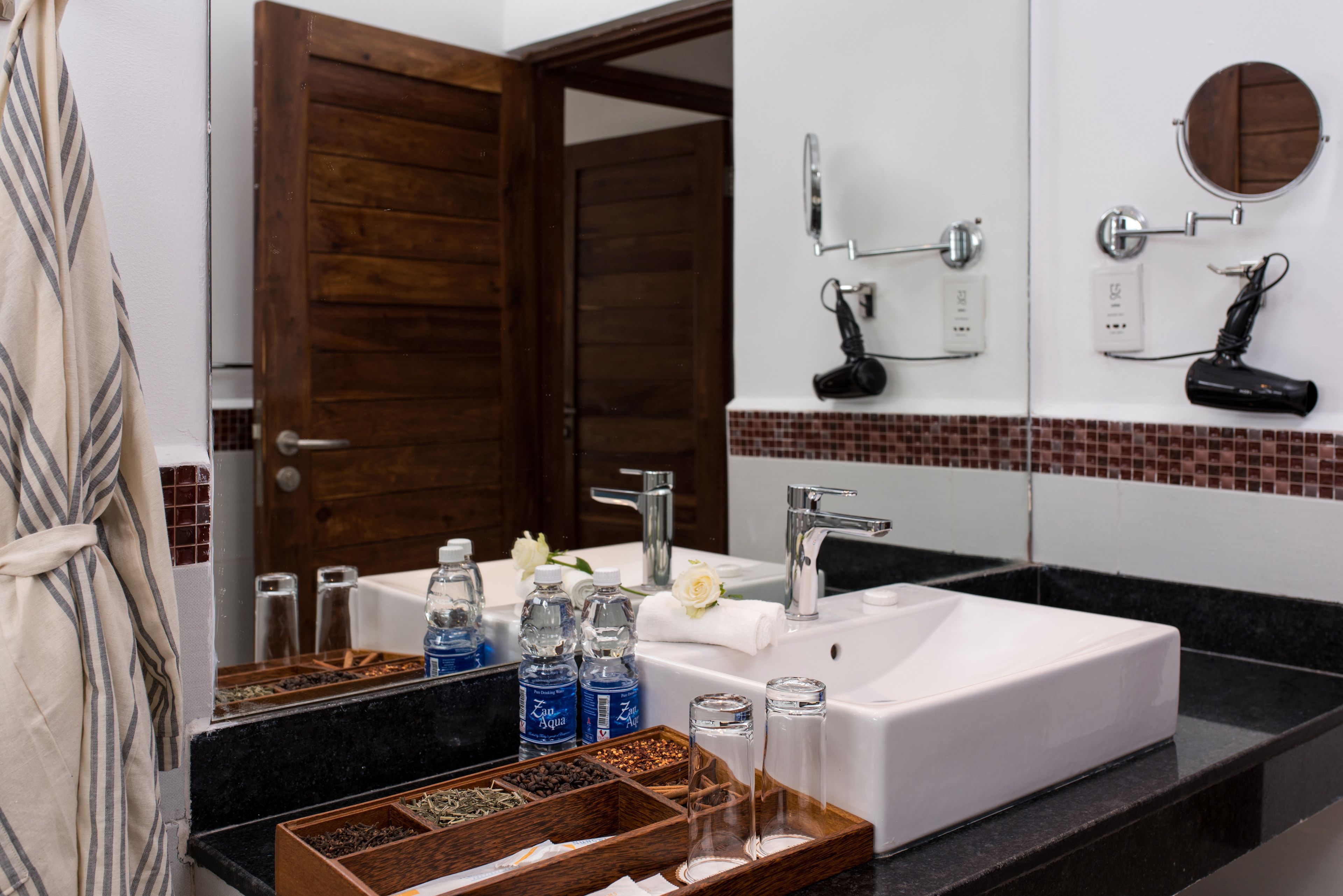 shower, eco-friendly toiletries, hair dryer, slippers