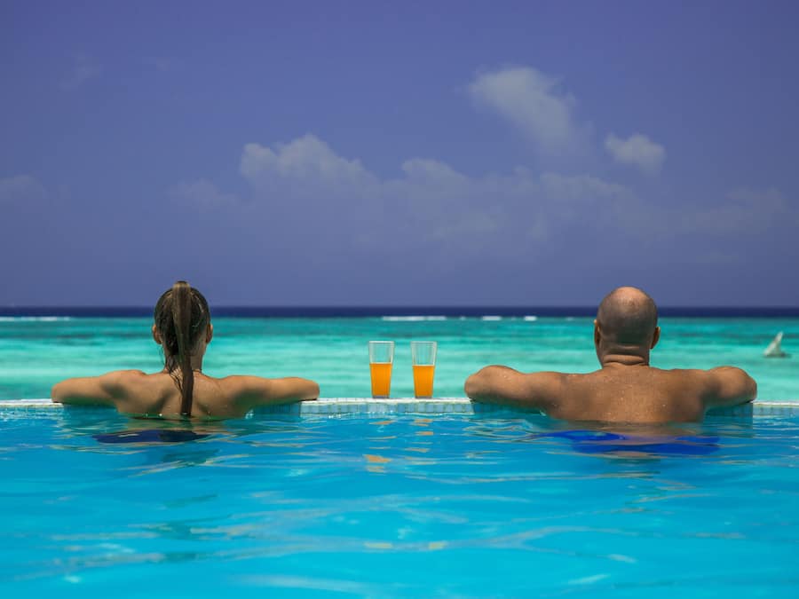 2 outdoor pools, open 7:00 AM to 8:00 PM, pool umbrellas, pool loungers