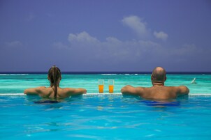 2 outdoor pools, open 7:00 AM to 8:00 PM, pool umbrellas, sun loungers