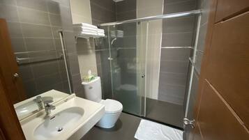Comfort Quadruple Room, 2 Double Beds | Bathroom | Shower, free toiletries, hair dryer, slippers