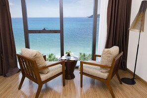 Minibar, in-room safe, desk, blackout curtains - Parama Apartments Ocean View (Nha Trang)