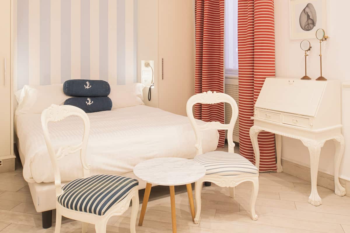 Premium bedding, pillowtop beds, minibar, in-room safe