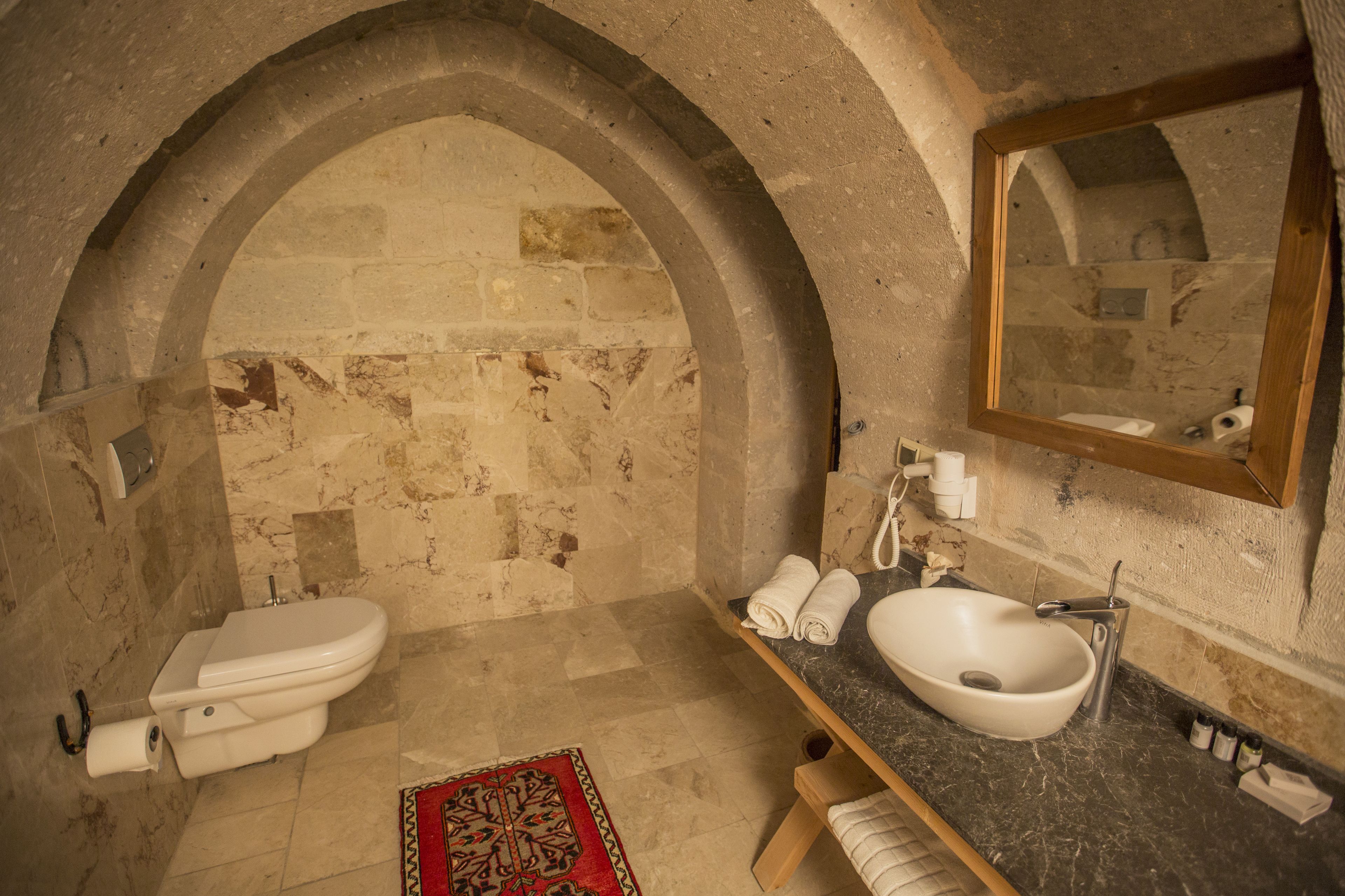 eco-friendly toiletries, hair dryer, bathrobes, slippers