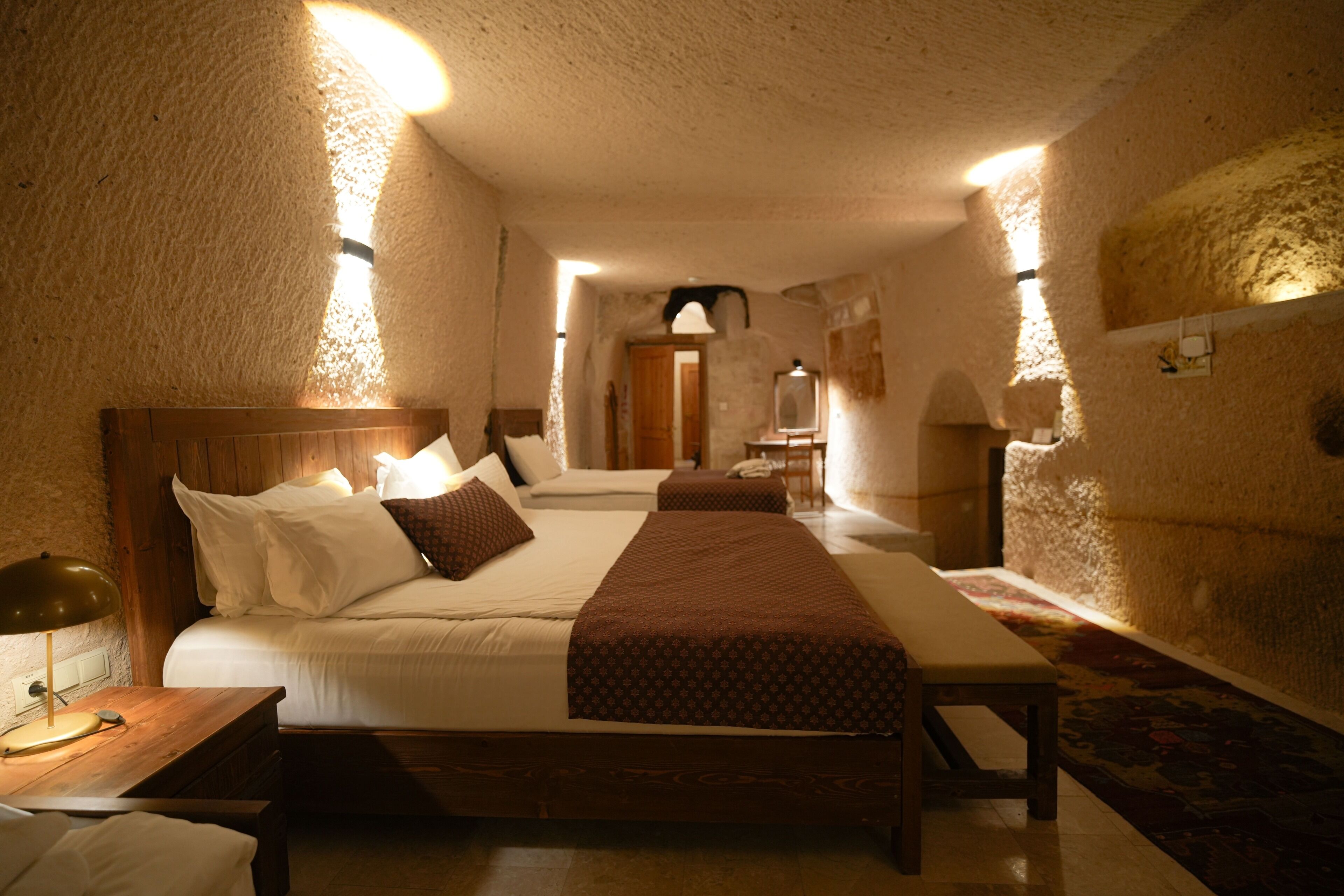 Superior Cave Suites Room | Premium bedding, minibar, individually decorated, individually furnished