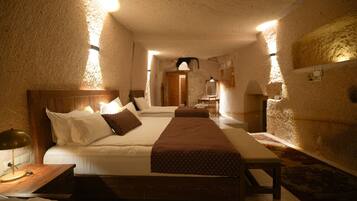 Superior Cave Suites Room | Premium bedding, minibar, individually decorated, individually furnished