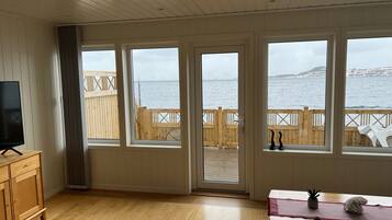 Fisherman Cabin 3 Bedrooms, with Sauna | Living area | 32-inch TV with cable channels