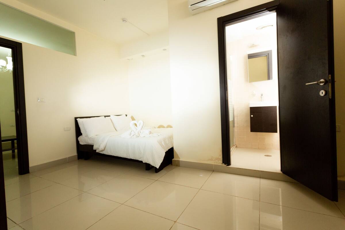 Premium bedding, blackout curtains, soundproofing, free WiFi
