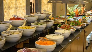 A buffet with various food items and utensils. - Fimar Life Thermal Resort Hotel (Göynücek)