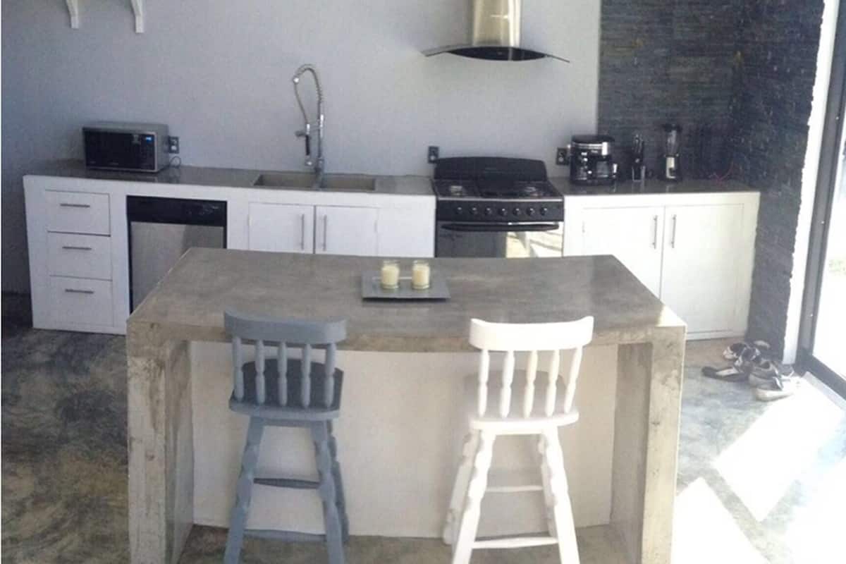 deluxe apartment | private kitchen | full-sized fridge, microwave, oven, stovetop