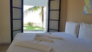 Quarto Frente Mar Terreo ( vista para praia) | Escrivaninha, Wi-Fi de cortesia