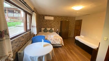 Triple Room | Minibar, desk, iron/ironing board, free WiFi