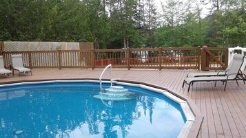 Seasonal outdoor pool, open 9:00 AM to 9:00 PM, sun loungers