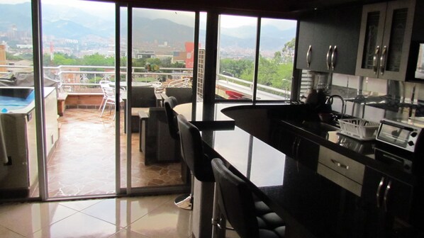 Business Penthouse, 3 Bedrooms, Hot Tub (3 Queen Beds) | Private kitchenette | Fridge, microwave, stovetop, toaster - Calle 10 Apartments (Medellín)