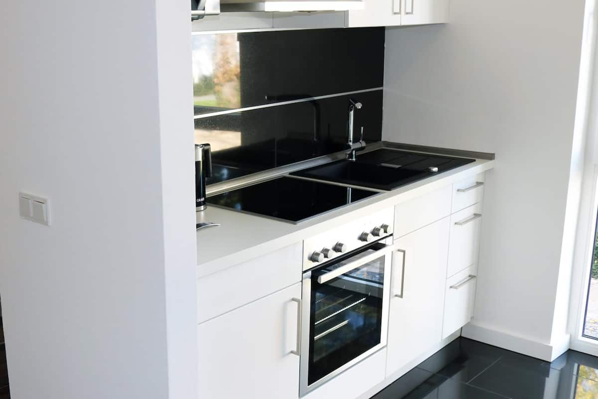 coffee/tea maker, electric kettle, dining tables