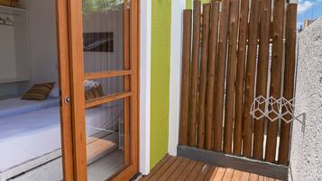 Apartamento superior | Terraço/pátio