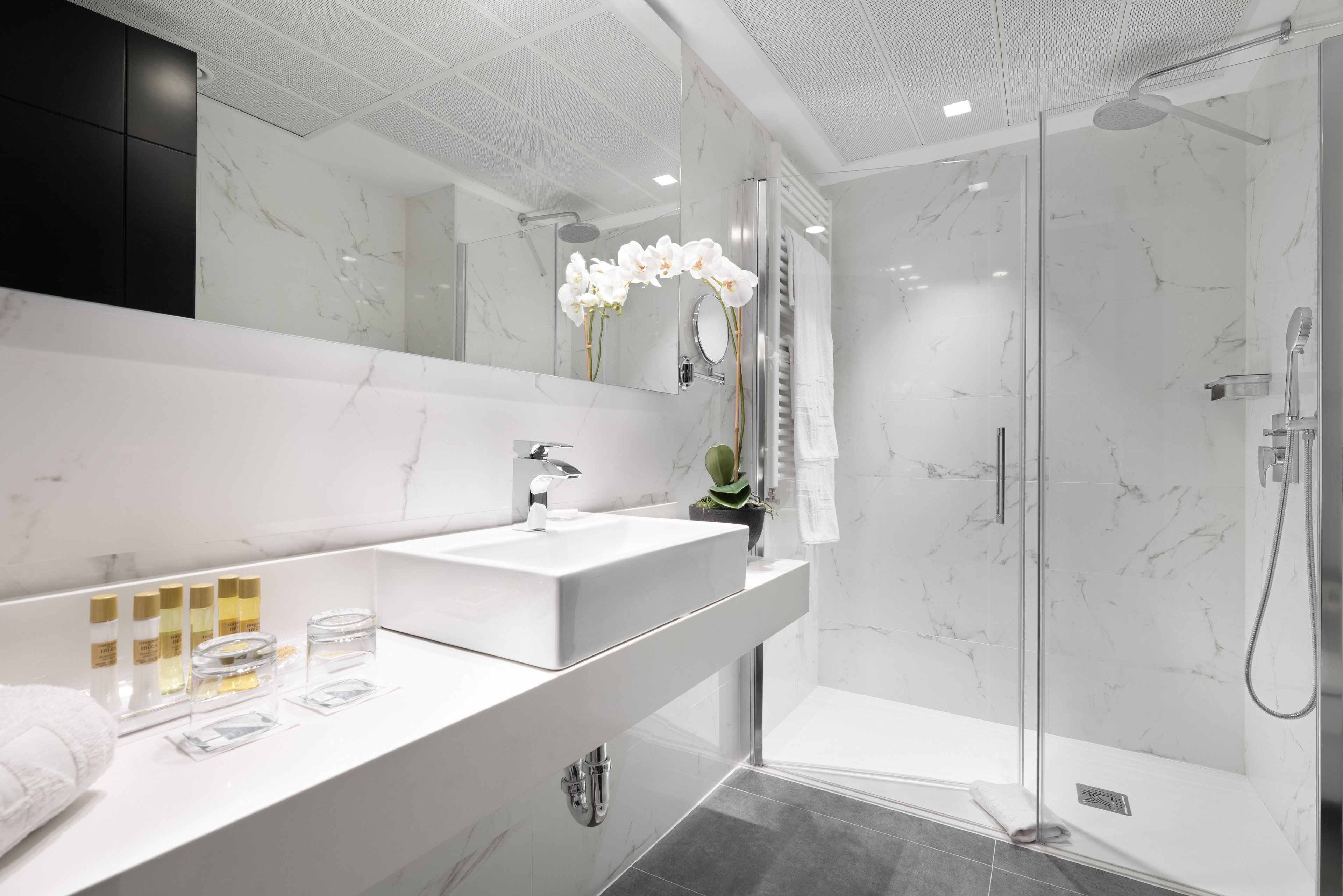 shower, eco-friendly toiletries, hair dryer, slippers