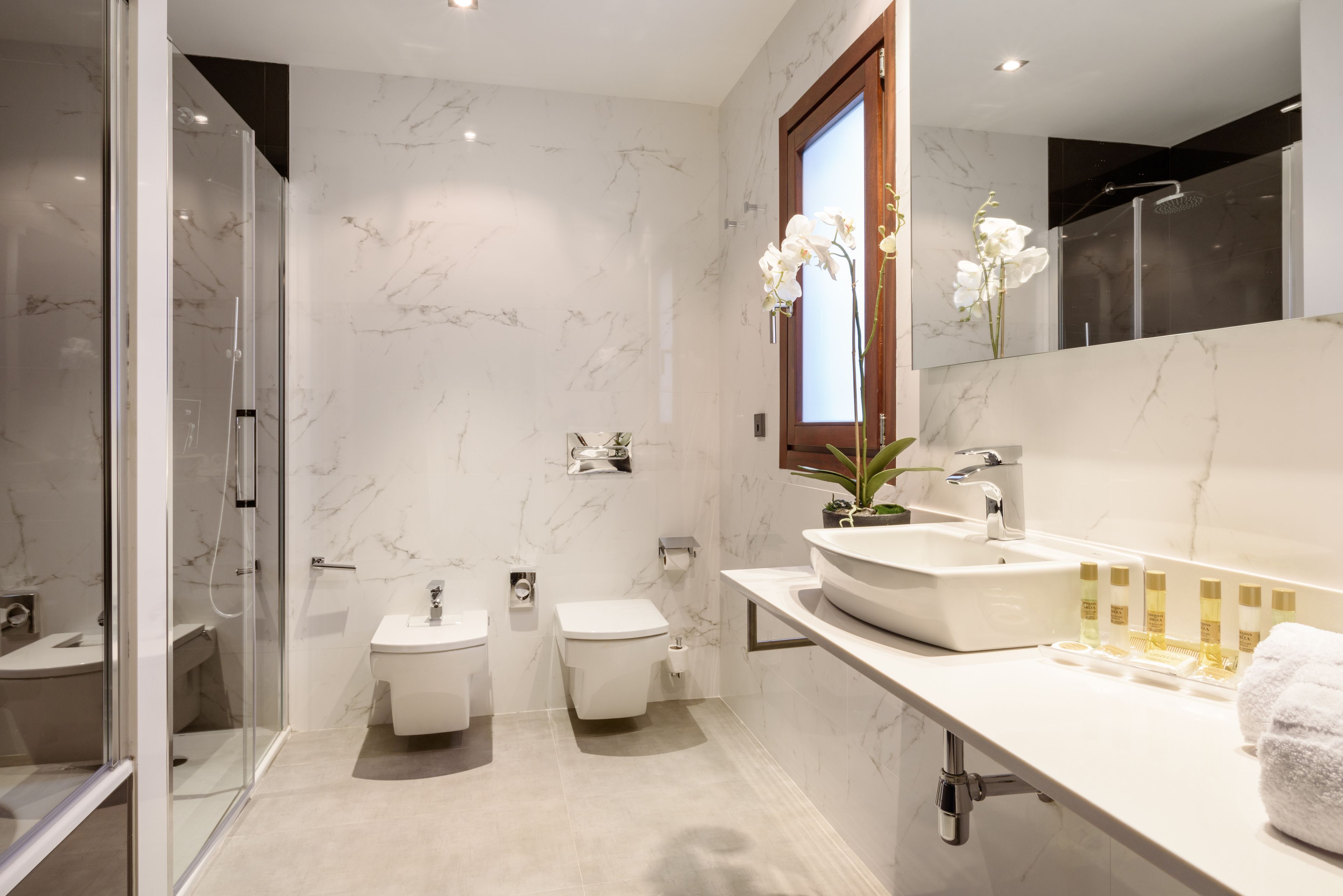 shower, eco-friendly toiletries, hair dryer, slippers