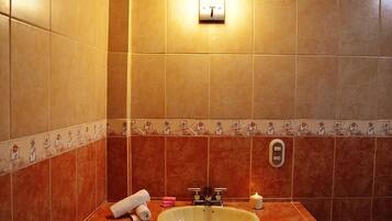 Standard Room, 1 King Bed, Jetted Tub | Bathroom sink