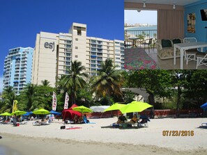 Un hôtel doté d’un balcon donnant sur une plage, d’un espace repas avec vue et d’une zone de plage équipée de parasols et de chaises longues.
