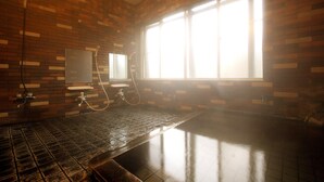 A bathroom with a large window, a mirror, and a shower area. - Park Lodge Sekine (Myoko)
