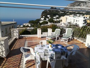 Outdoor dining - A centrally located house with a breathtaking view of the Island.  (Capri)