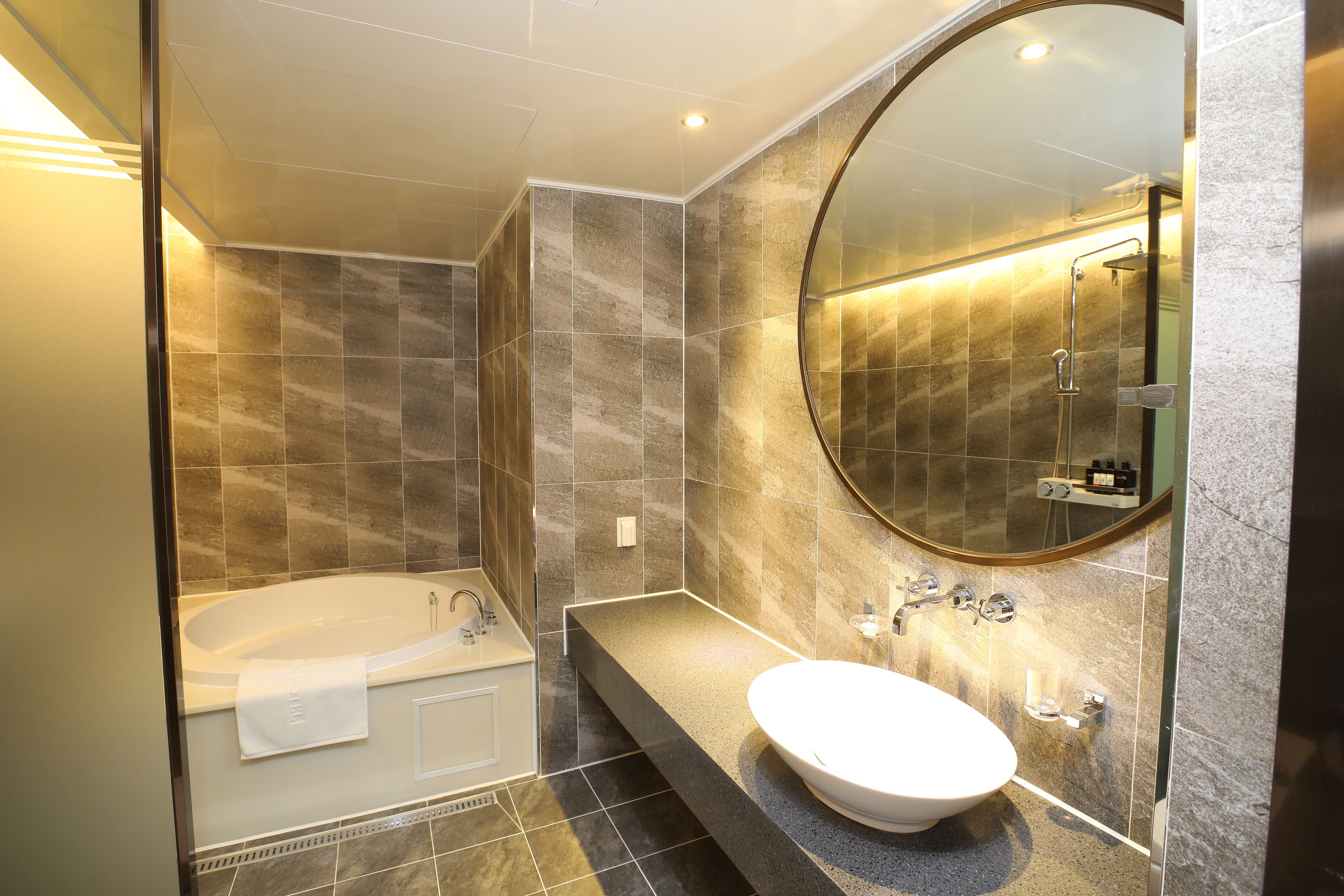 premier double room | bathroom | separate bathtub and shower, free toiletries, hair dryer, bathrobes