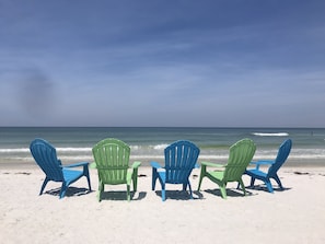 On the beach, sun loungers
