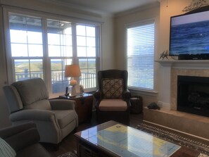 Smart TV, fireplace, DVD player, books