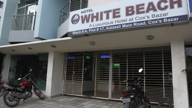 A hotel sign for Hotel White Beach at Cox's Bazar. - White Beach Hotel (Cox's Bazar)
