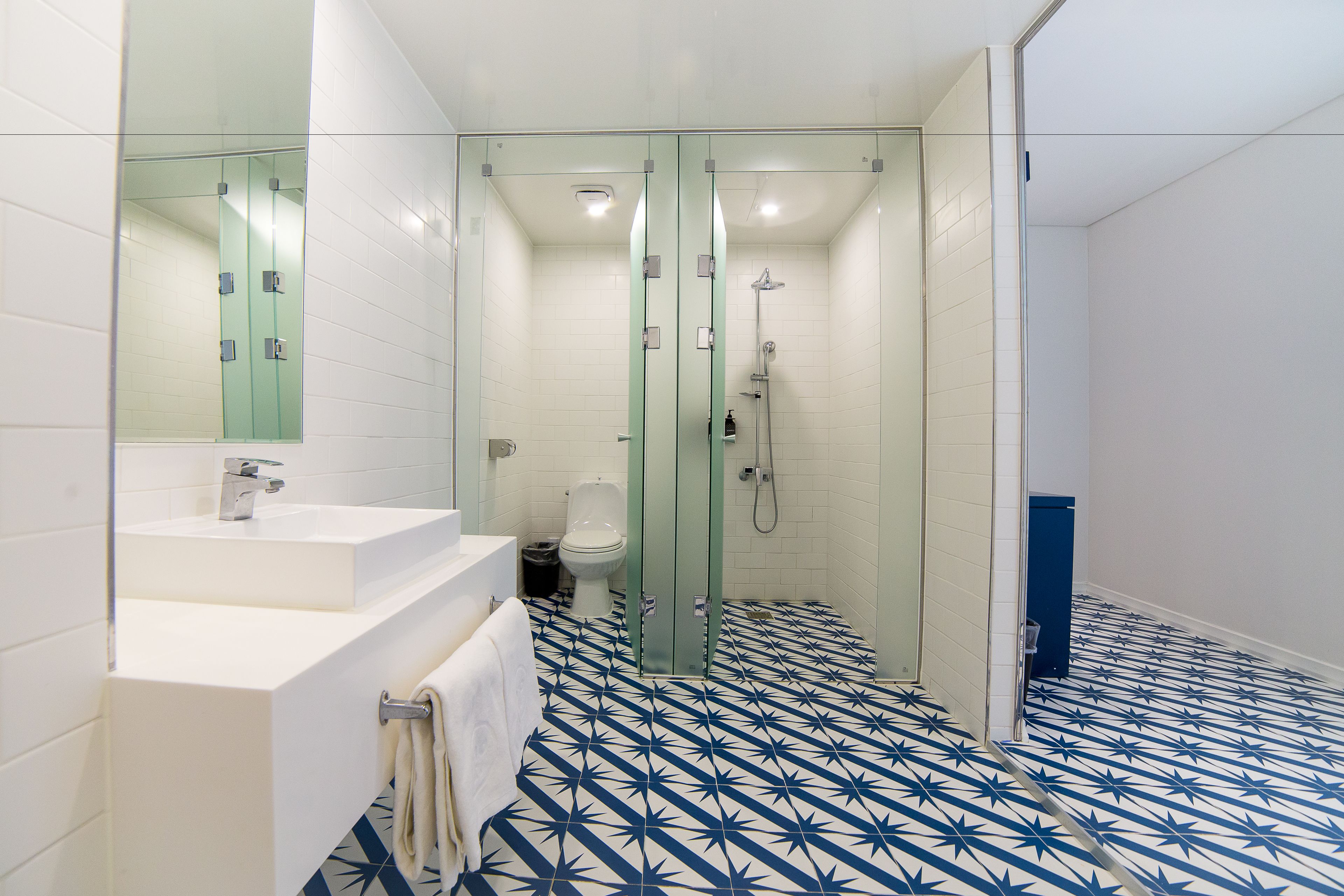 family room | bathroom | hair dryer, bathrobes, slippers, towels