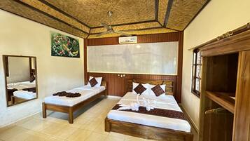 Deluxe Triple Room, Garden View | 1 bedroom, desk, blackout curtains, soundproofing